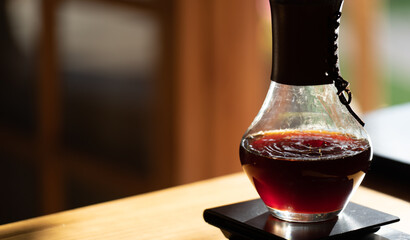 Traditional Brazilian Method of Dripping Coffee into Glass Container