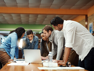 You all need to see this. a group of university students studying in the library.