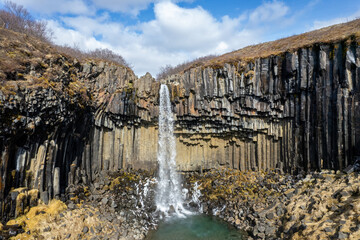 Aerial beautiful spring day view of Svartifoss waterfall, Iceland