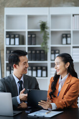 Obraz premium Happy smiling businessman feel happy work complete Teamwork success, success at work in the office concept.
