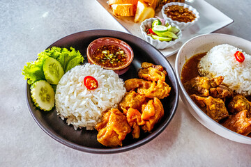 Thai Street Food Delight: Savory Fried Chicken with Fish Sauce and Rice