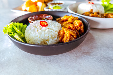 Thai Street Food Delight: Savory Fried Chicken with Fish Sauce and Rice