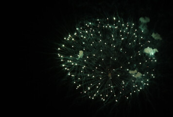 Fireworks in the night sky, close-up, abstract background with copy space