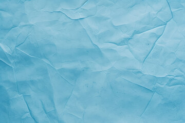 Obraz premium Creased paper texture. Distressed overlay. Wrinkled noise. Blue color grain dust scratches on light uneven rough abstract copy space background