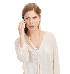 Thats not what I wanted to hear. Studio shot of an attractive young woman talking on a mobile phone against a white background.