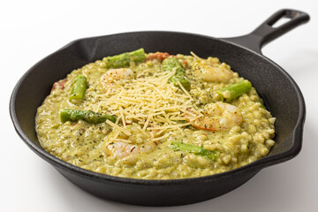 Asparagus risotto on a white background