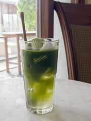 Green tea with coconut juice in coffee shop cafe