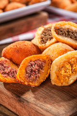 Various brazilian snacks deep fried. (Coxinha, kibe, empadinha e risolis).