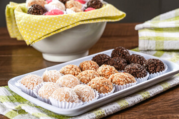 Various brazilian party sweets. (Beijinho, cajuzinho e brigadeiro)