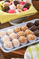 Various brazilian party sweets. (Beijinho, cajuzinho e brigadeiro)