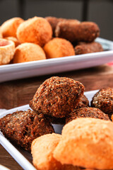 Various brazilian snacks deep fried. (Coxinha, kibe, empadinha e risolis).