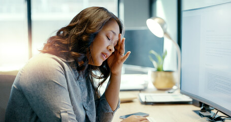 Business woman, headache or stress at computer screen while frustrated with work and fatigue....