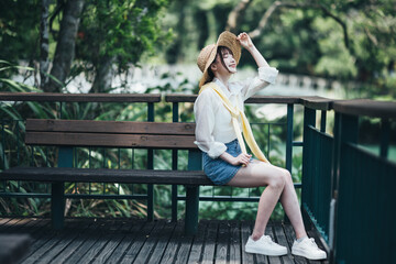 Fototapeta na wymiar portrait of an asian happy girl in summer