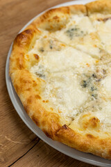delicious italian pizza on a wooden table
