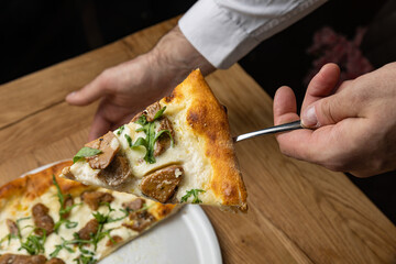 delicious italian pizza on a wooden table
