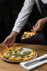 delicious italian pizza on a wooden table
