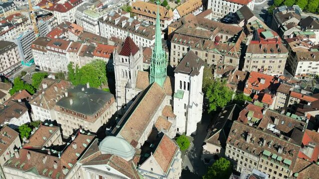 Aerial video of Geneva, Geneva city view to the lake. Taken above the old town. Zoom in Pan CCW 4K