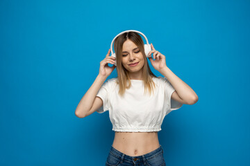 Portrait of her she attractive lovely charming cheery girl listening podcast motivation playlist or...
