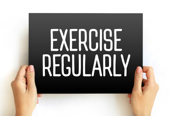 Exercise Regularly text on card, concept background