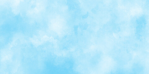 Abstract Watercolor shades blurry and defocused Cloudy Blue Sky Background, blurred and grainy Blue powder explosion on white background, Classic hand painted Blue watercolor background for design.	