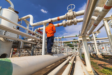 Naklejka premium Male worker inspection at valve of visual check record pipeline oil and gas