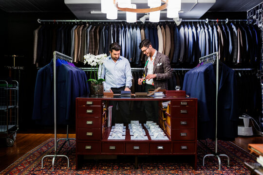Men in clothing store