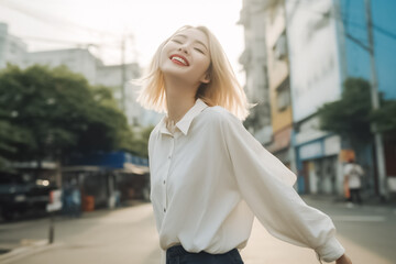 Fototapeta premium A beaming young woman with blonde hair and a minimalist shirt poses in front of a lively street, her infectious smile catching the eye. generative AI.