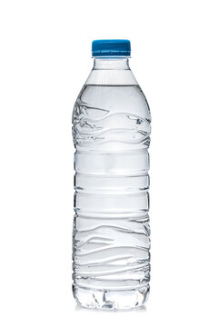 one half litre plastic water bottle with blue cap isolated on white backgroubd