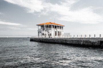 Pier in the sea with beautiful small house in Istanbul stock photo - obrazy, fototapety, plakaty