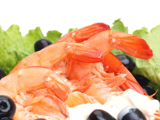 Shrimps on a white plate isolated