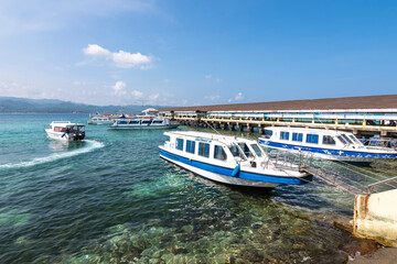 Boracay, Malay, Aklan, Philippines - Small ferry boats docked at Boracay Jetty port.