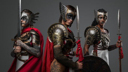 Studio shot of isolated on gray background amazons from past with make up.