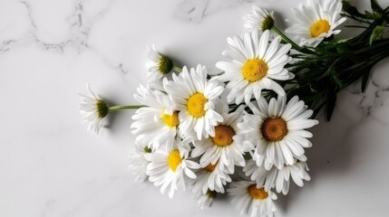 Fototapeta premium Small bouquet of daisies lying on a white table top view. AI generated