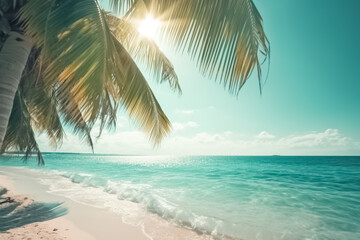 Fototapeta na wymiar Sunny tropical beach with palm leaves and paradise island. Summer sandy beach with blur ocean on background. Summer vacation and holiday business travel concept. 