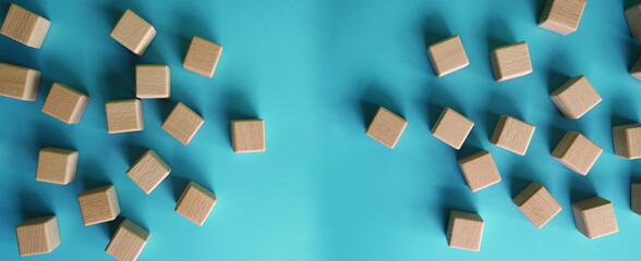 empty wooden cube on blue background learning increase iq development for kids Top view of children's toys. Educational game.