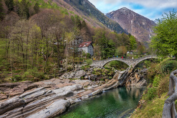 Fototapeta premium Double-arched Ponte dei salti Roman bridge in Verzasca Valley close to Locarno, Switzerland.