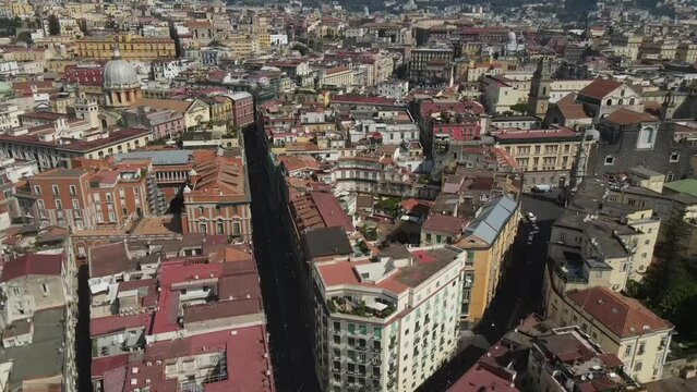 Aerial video on Picoola, Italy, on a sunny day over ancient buildings 