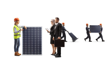 Businesspeople talking to a female engineer with a solar panel