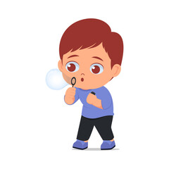 Cute boy trying to blow soap bubbles