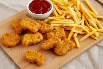 Chicken Nuggets and French Fries with Ketchup Ready to Eat. Close-up