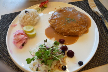 Asian food pork cutlet and sauce 