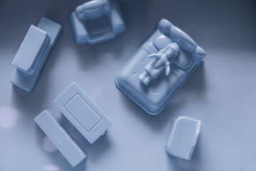 3D design of mental health in a lonely woman with insomnia and depression on bed in a grey blue room shot top down