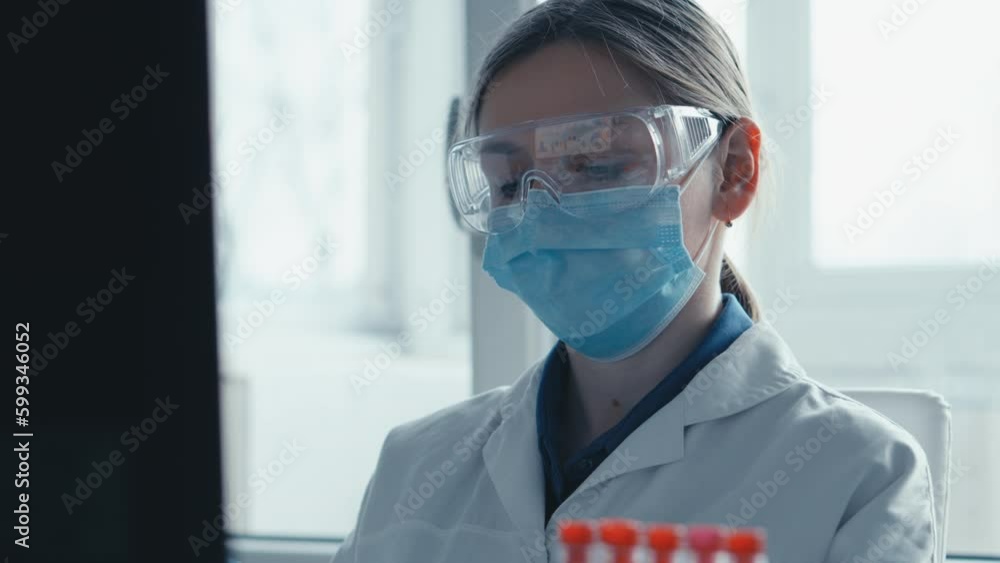 Poster Computer simulation in the laboratory to analyze medical data and predict chemical interaction of substances. The scientist enters the data and results of the study into the computer