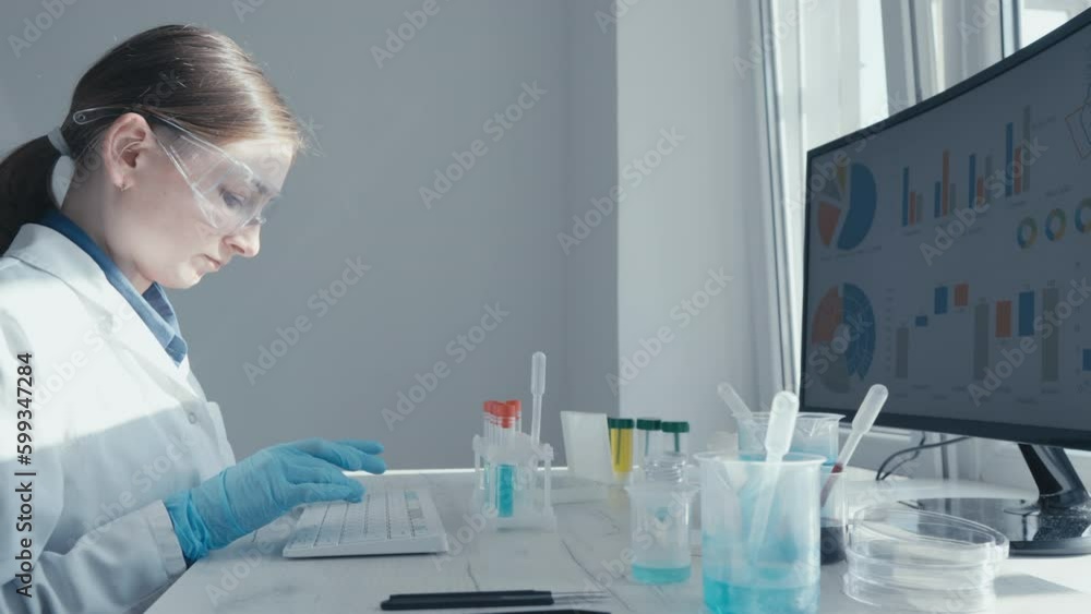 Aufkleber Behind a computer screen, laboratory technician enters data to study chemical reaction in biotechnological laboratory. Data storage and analysis, which helps scientists understand biological processes