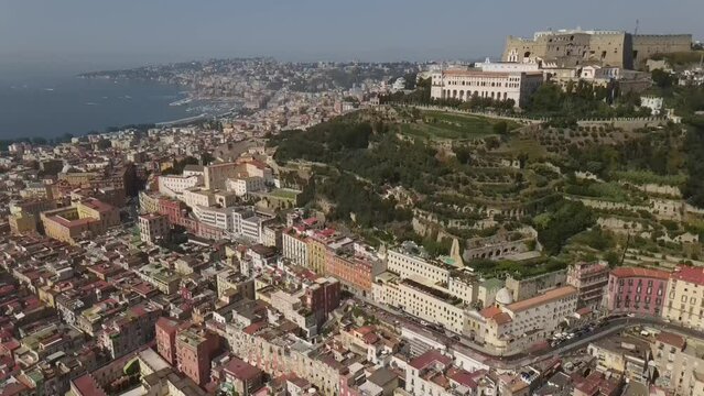 Aerial video on Picoola, Italy, on a sunny day over ancient buildings 