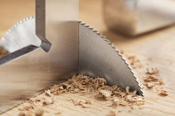 Circular saw cutting wooden plank. Circular milling in oak block.