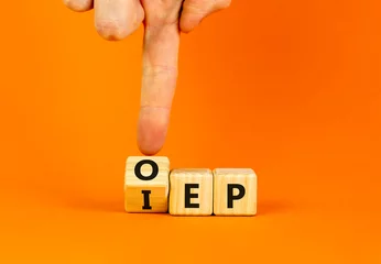 Deurstickers IEP or OEP symbol. Concept words IEP initial enrollment period OEP open enrollment period. Doctor hand. Beautiful orange background. Medical initial or open enrollment period concept. Copy space. © Dzmitry
