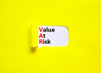 VAR Value at risk symbol. Concept words VAR Value at risk on beautiful white paper. Beautiful...