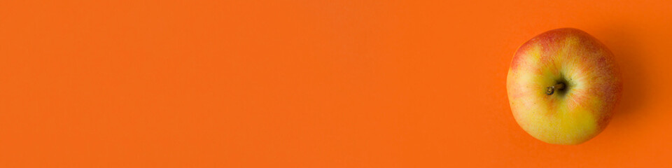 Banner. Apple on an orange background