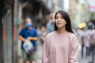Fototapeta premium Woman walk in the street